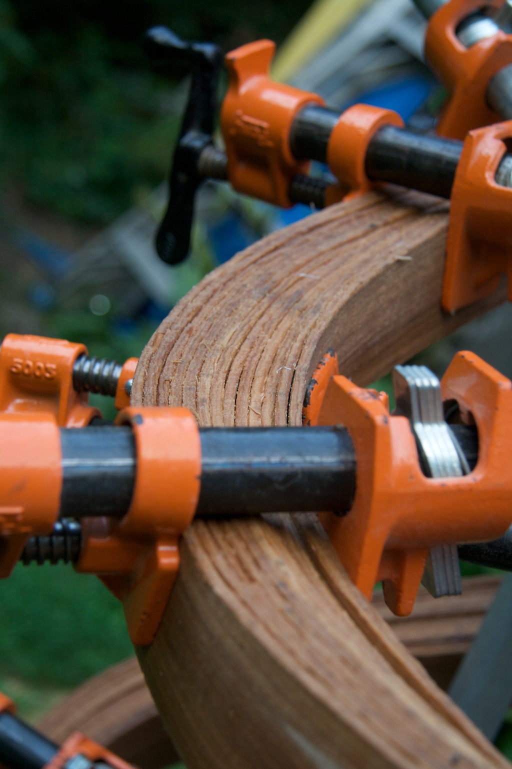 The construction process was directed, but experimental. I used the clamps in the way I saw the zipties acting on the tensioned reeds and relied on the glue between the laminations to hold the form.