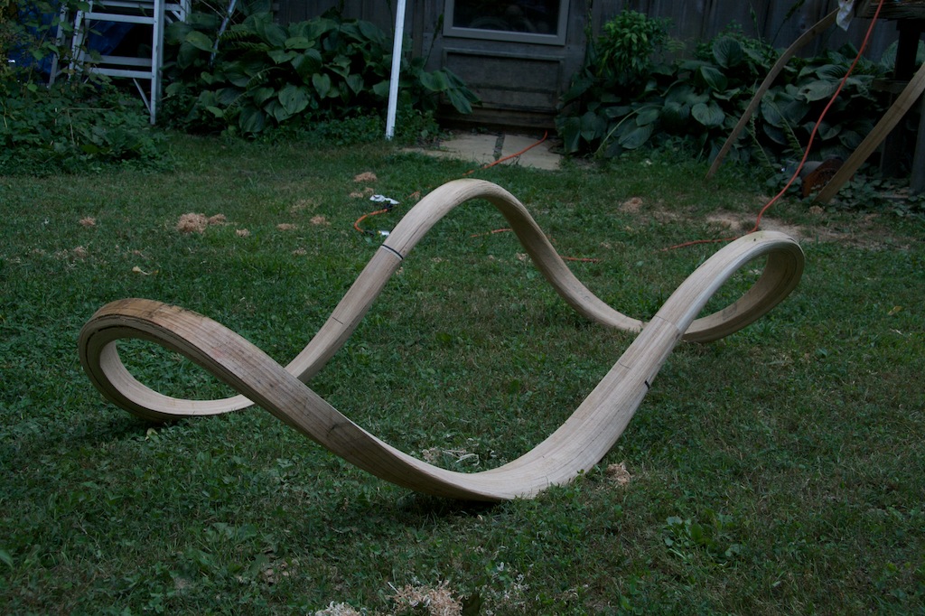 Two halves were joined with subtle details of ebony and holly. I used an angle grinder to rough the form, rasps to refine, and finished with sanding and coats of tung oil.