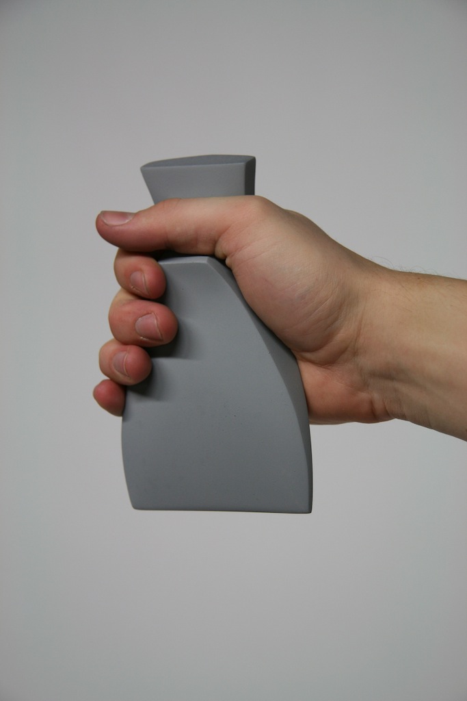 The axe is for more finessed users. It can be used in either hand.